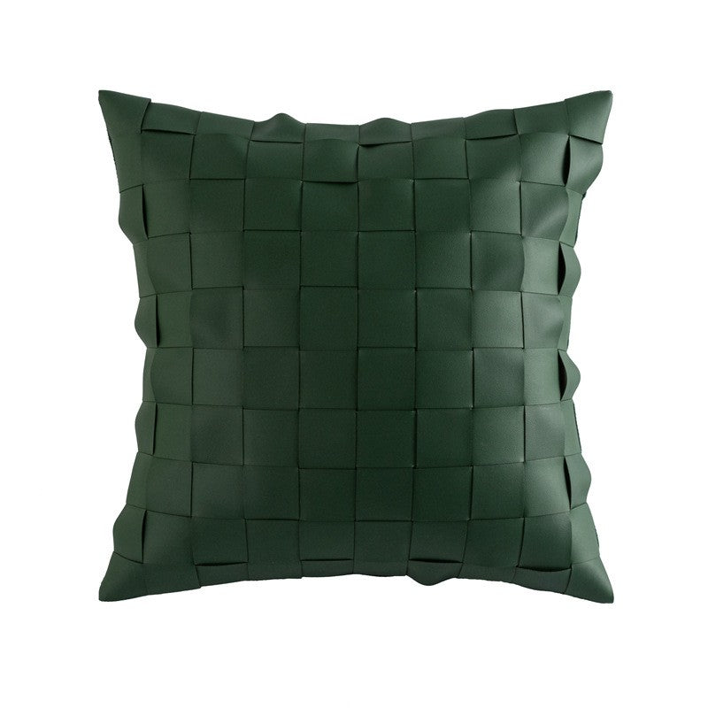 Cuscini e fodere in pelle con forme geometriche di colore verde