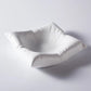 Piatto in ceramica a forma di soffice cuscino