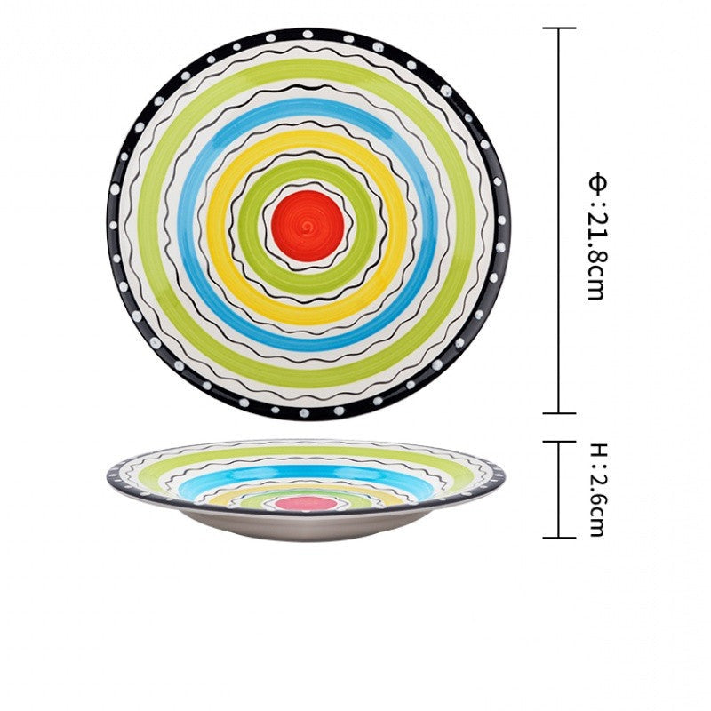 Piatti coloratissimi in ceramica con fiori e forme geometriche 