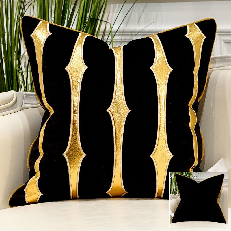 Fodere e cuscini eleganti con strisce dorate