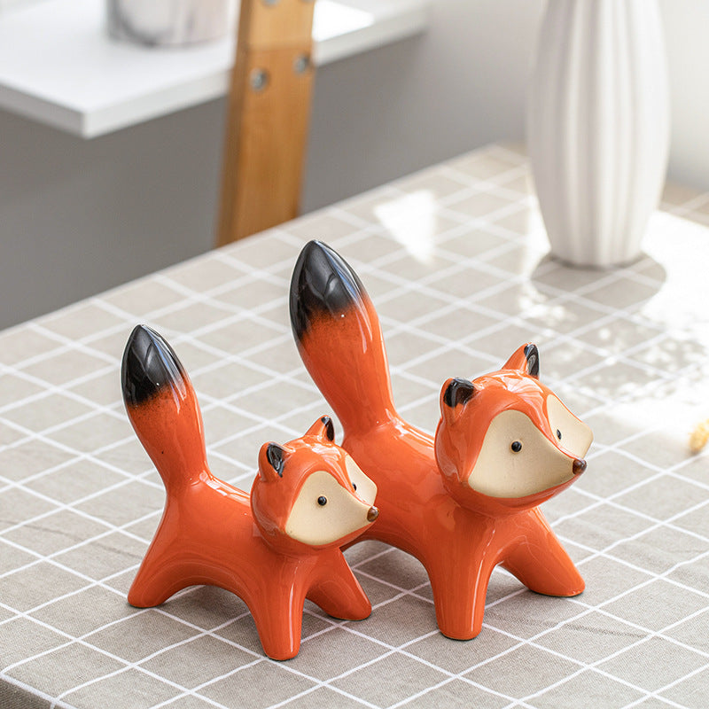 Set di 2 piccole simpatiche volpi in ceramica
