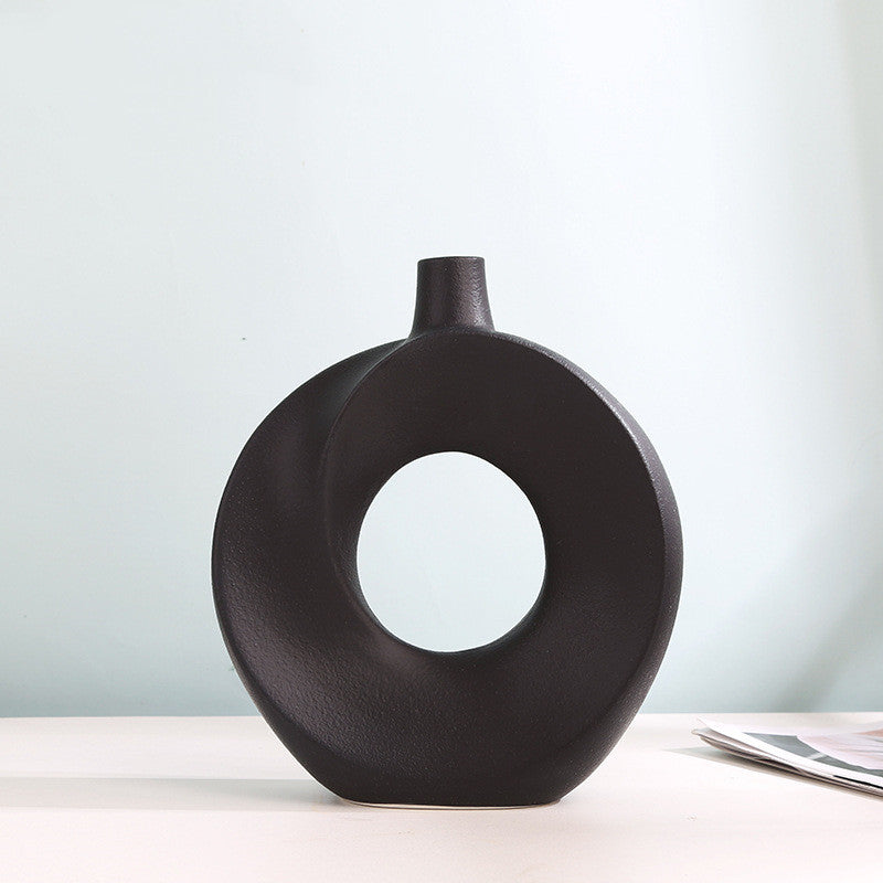 Vaso in ceramica elegante a forma di ciambella