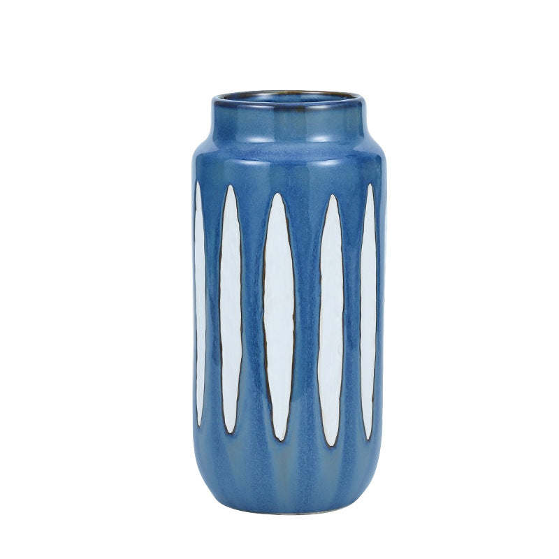 Vaso in ceramica blu con strisce bianche