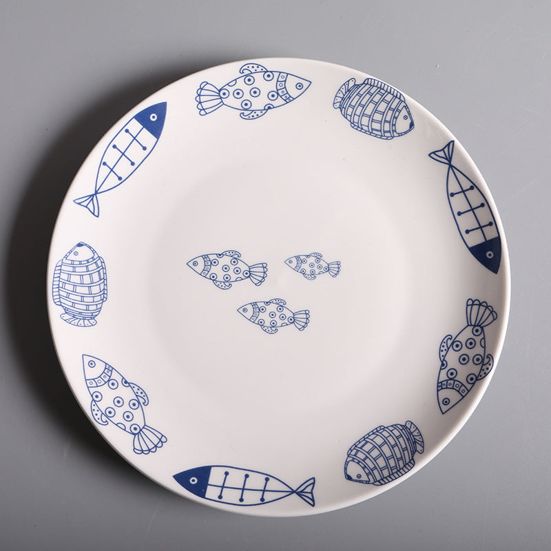 Piatto in ceramica con pesci blu