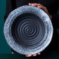 Piatti fondo in porcellana con spirale in rilievo "Roccia"