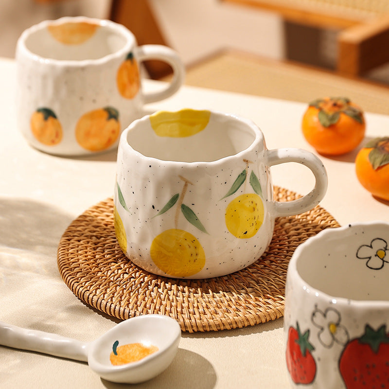 Tazza in ceramica con limoni e arance