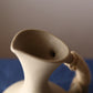 Brocca elegante in ceramica con comodo manico