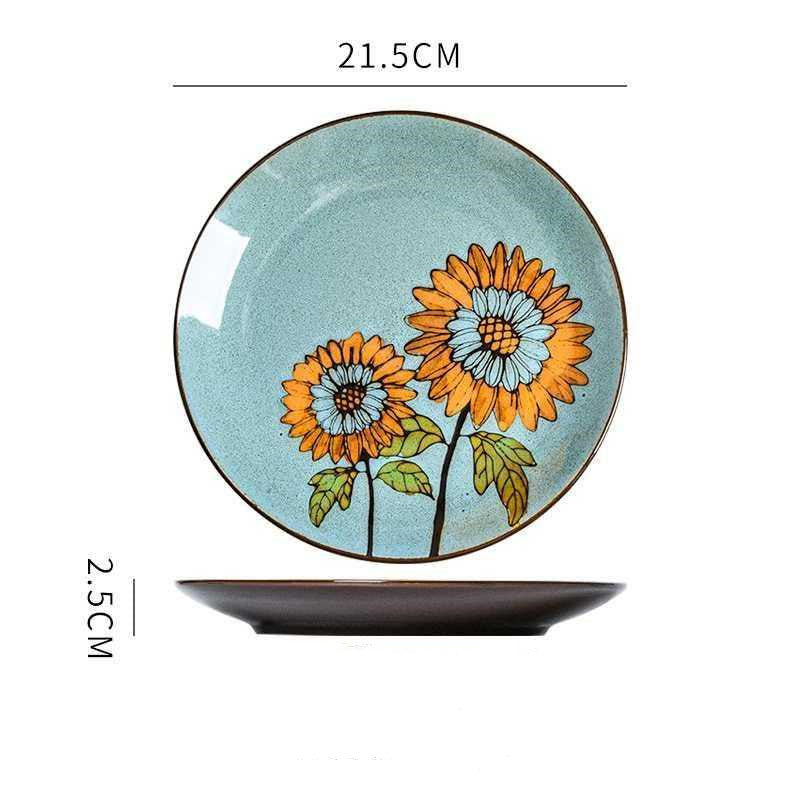 Piatti in ceramica colorati con forme geometriche e fiori dipinti a mano