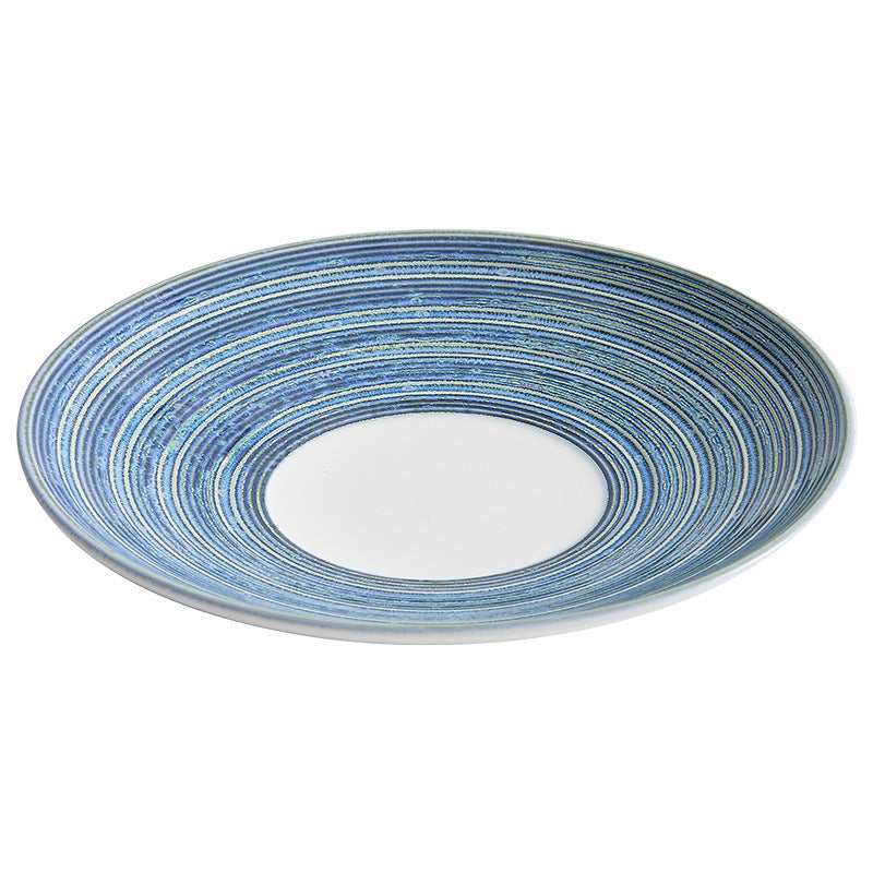 Piatto in ceramica elegante con pennellate blu