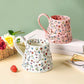 Grande tazza con fiori in ceramica