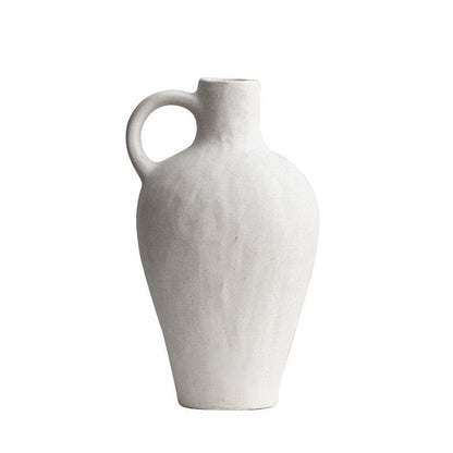 Vaso bianco in ceramica con manico laterale