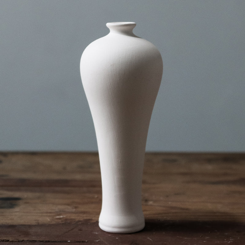 Vasi in ceramica bianchi minimalisti